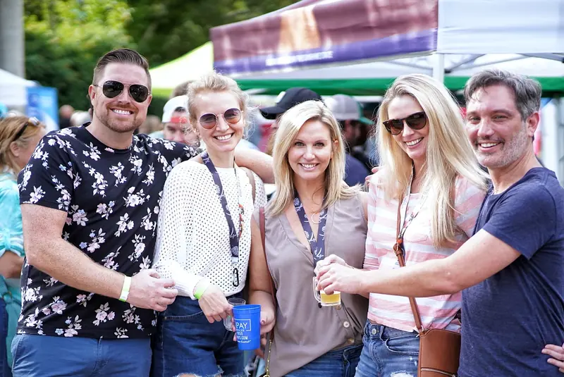 Group of five friends enjoying the festival together
